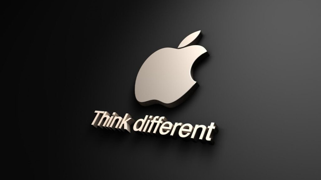 A close-up of the Apple logo with the words "think different" written under it