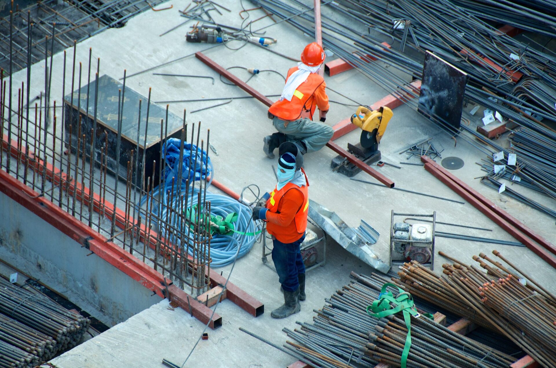 Construction site with workers | OpenAsset