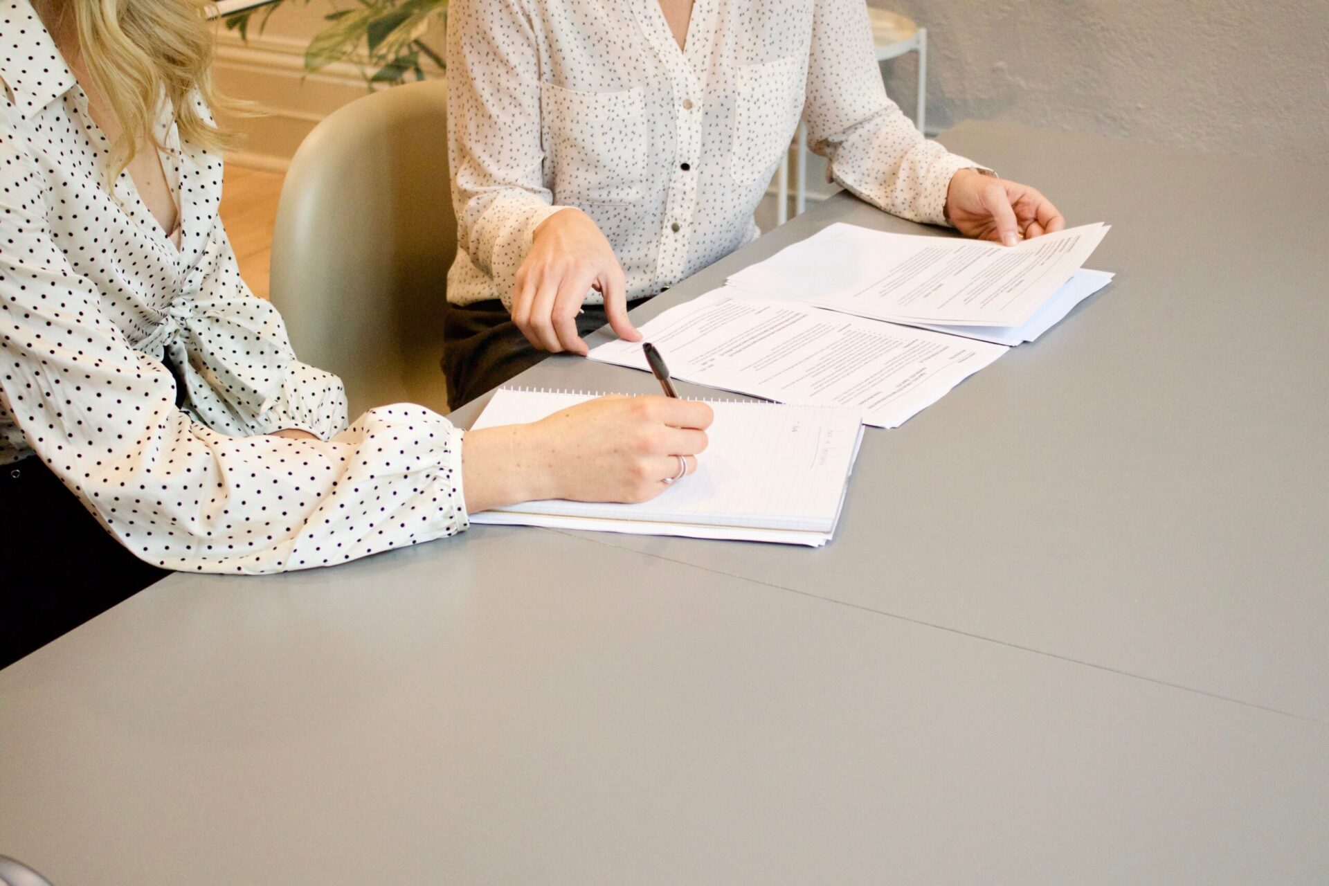 Two Woman Working on a Proposal | OpenAsset