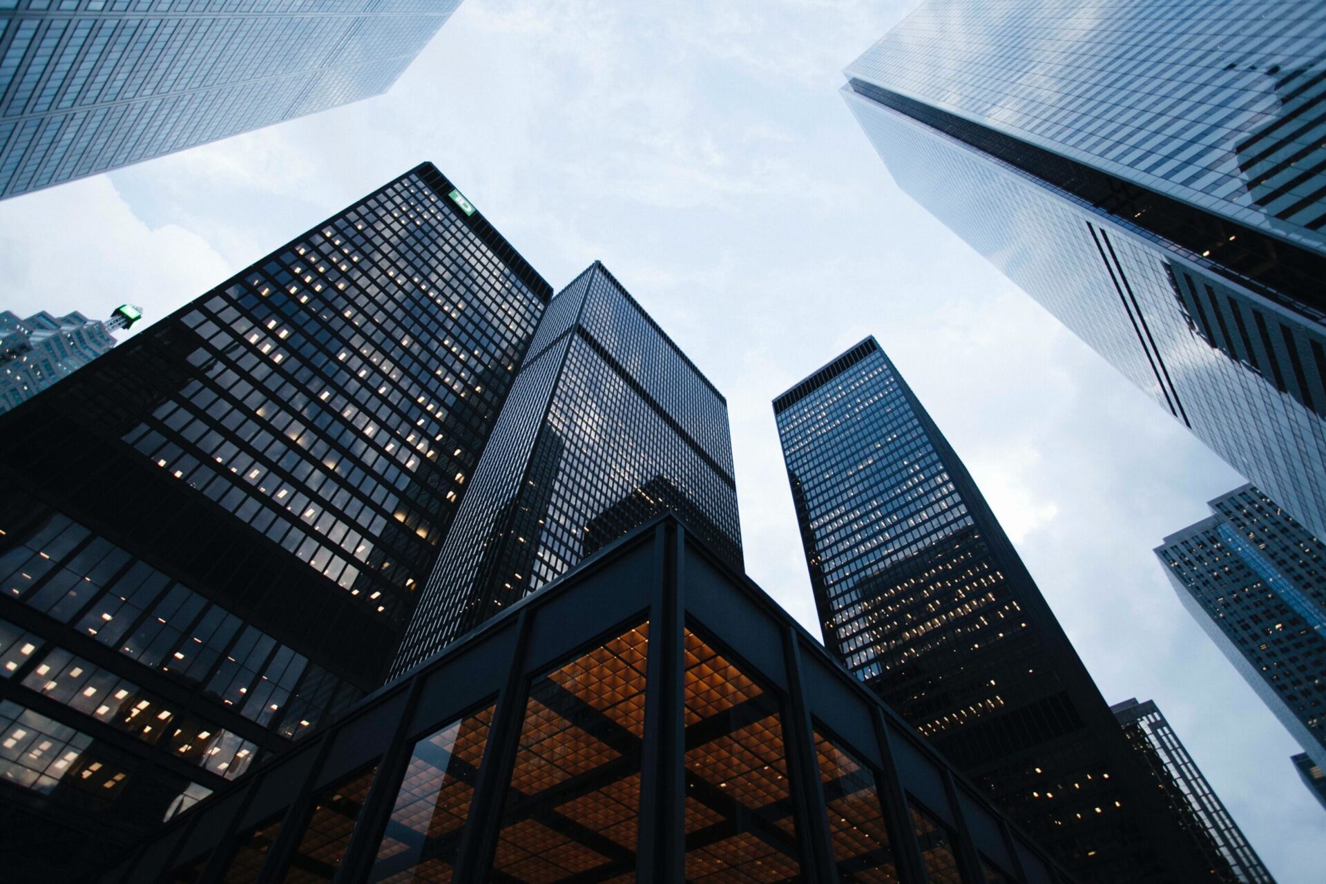 ground floor image of skyscrapers climbing into a grey sky | OpenAsset